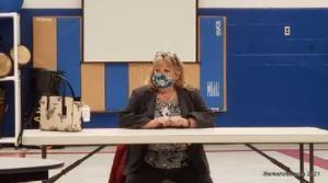 Lisa Blackmer is interviewed Thursday night at Clarksburg School