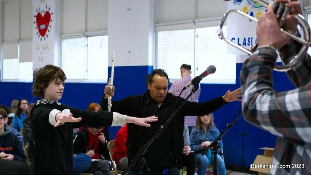 A student takes total control over the five-piece BAAMS faculty group at Clarksburg School on Friday. The music workshop was made possible by a Mass Cultural Council