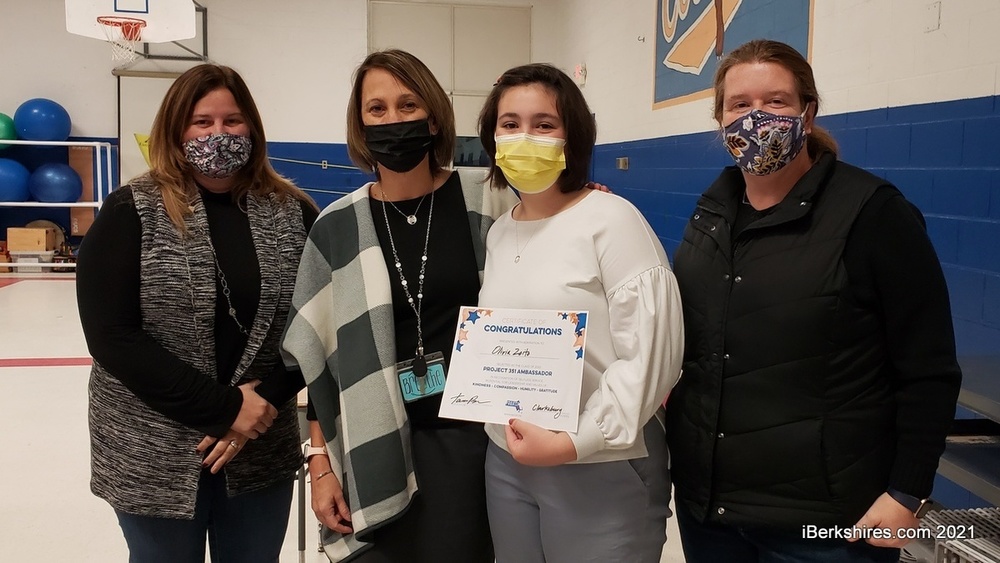 Clarksburg eighth-grader Olivia Zoito is recognized Thursday as the school's Project 351 Ambassador. Posing with her are School Committee members Laura Wood and Cynthia Brule and Principal Tara Barnes.