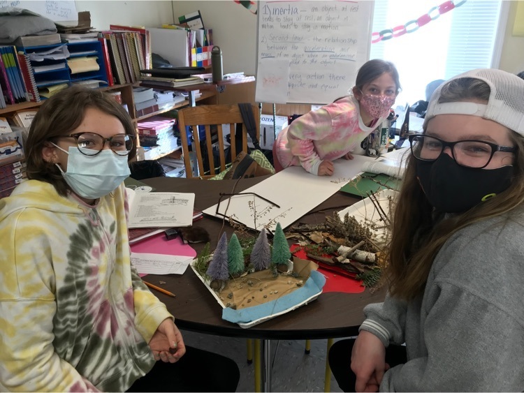 Students work on a diorama about the Northwest coastal region.